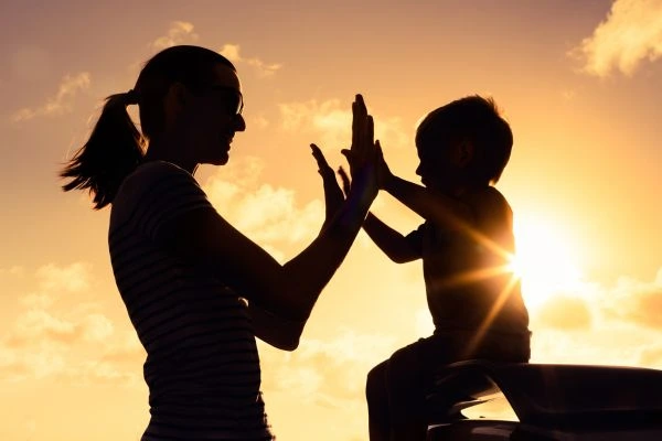 Image of happy mother and child after resolving child arrangements Bury St Edmunds